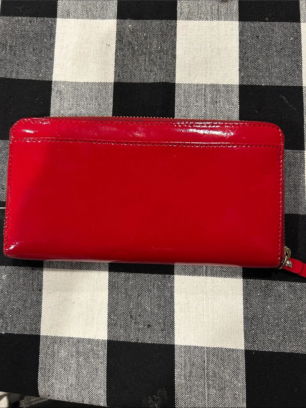 Kate Spade glossy red patent zip wallet with gold plaque